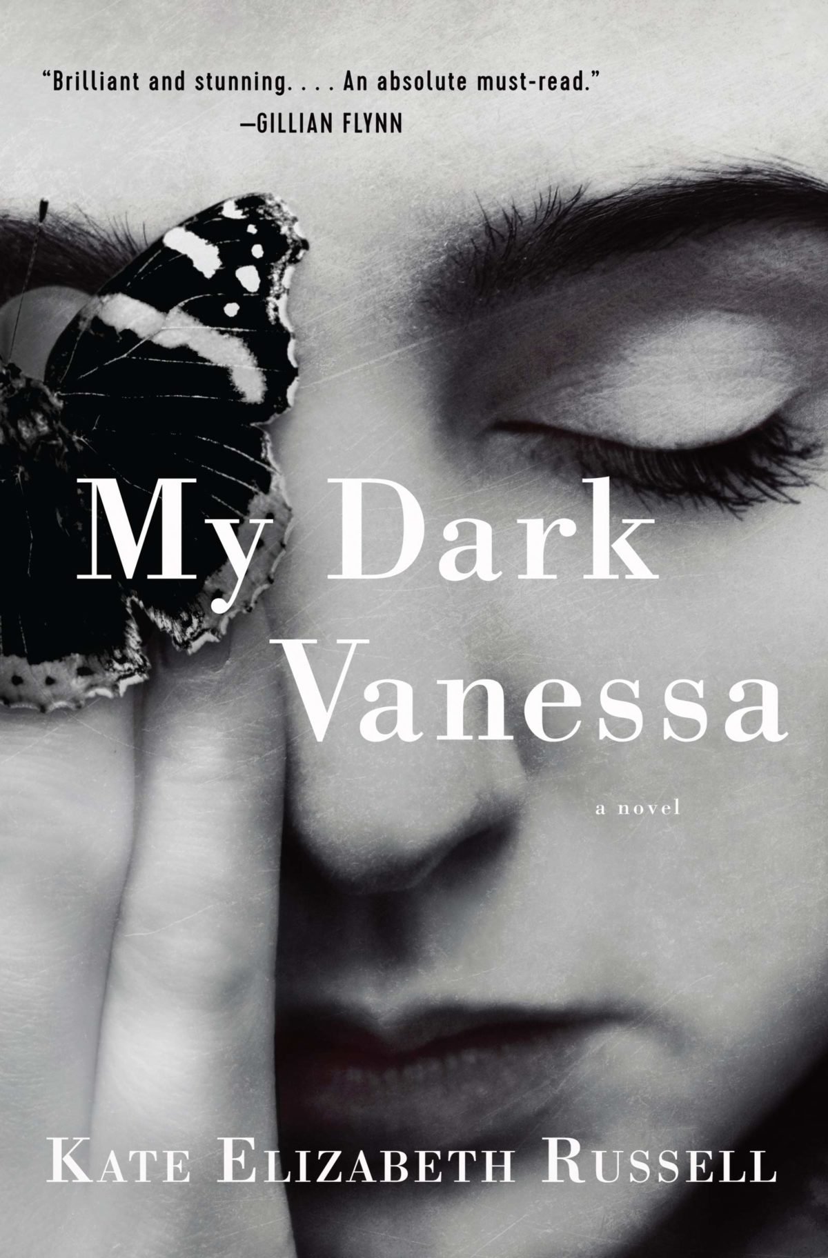 The book cover for My Dark Vanessa feat. a black and white close-up image of a woman's face with one eye covered by a butterfly.